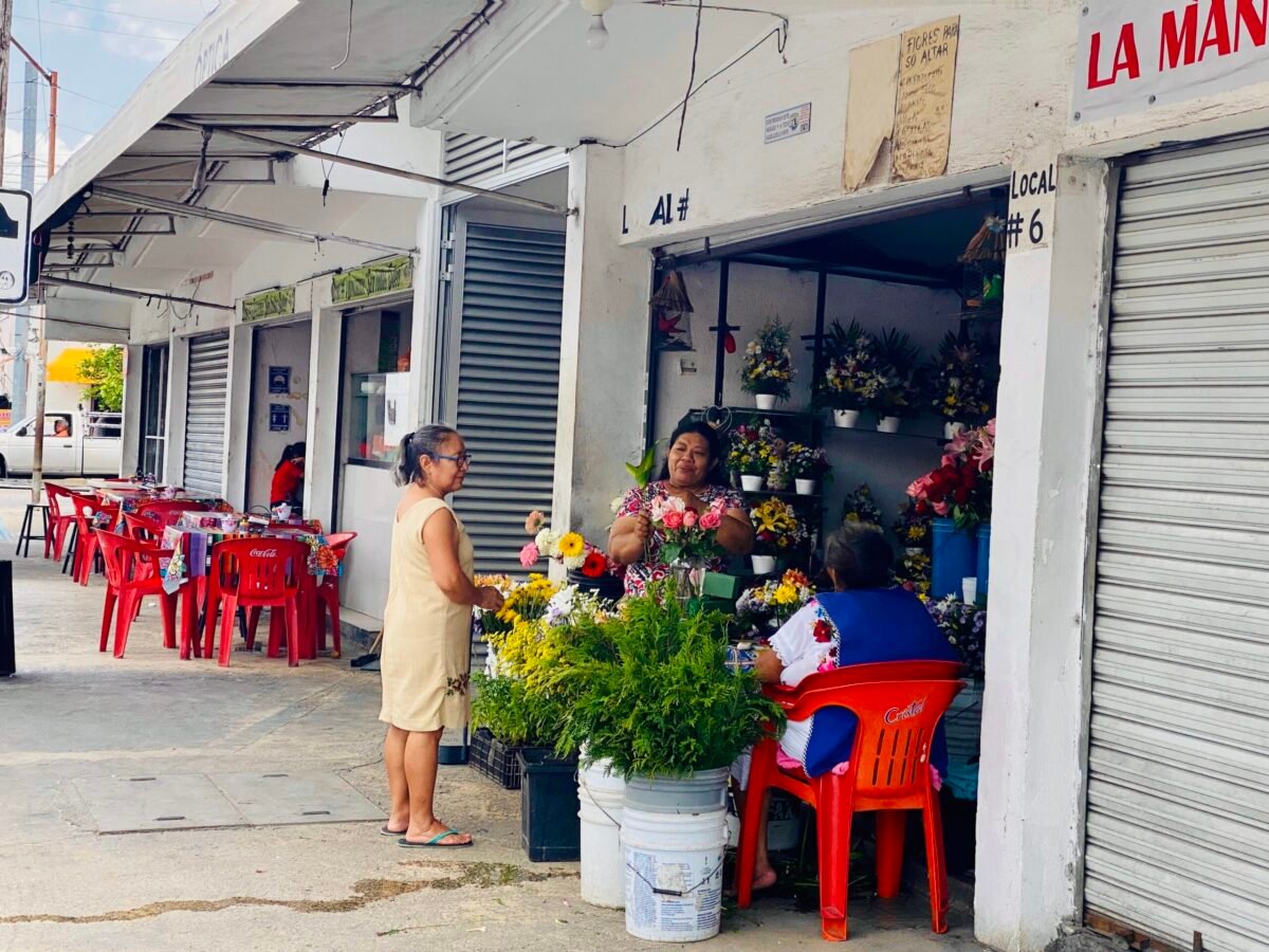 Ladies in a local flower market in Chen Beck Merida Mexico