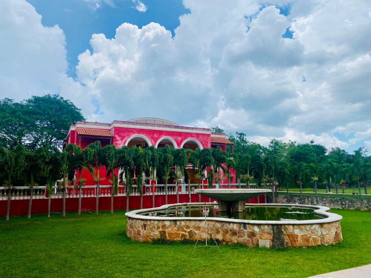 Red Hacienda outside of Merida Yucatan with fountain and gardens