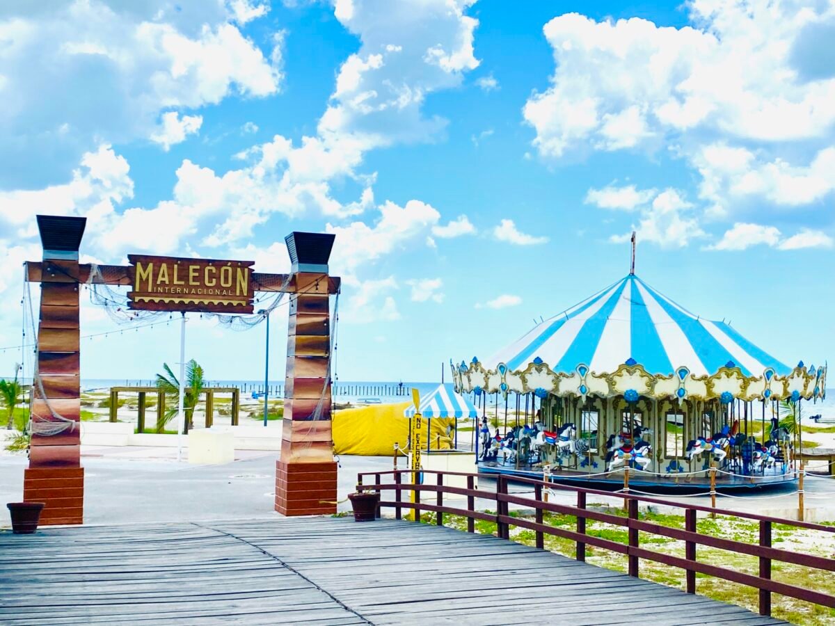 Malecón Internacional entrance with a carousel on the beachfront boardwalk in Progreso, Yucatán