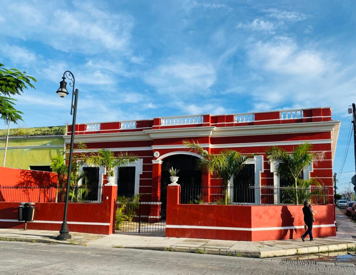 Red colonial house on a corner on Calle 59 in Merida Mexico