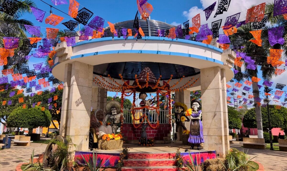 Movie characters Coco on a colorful platform in a park outside Merida Mexico