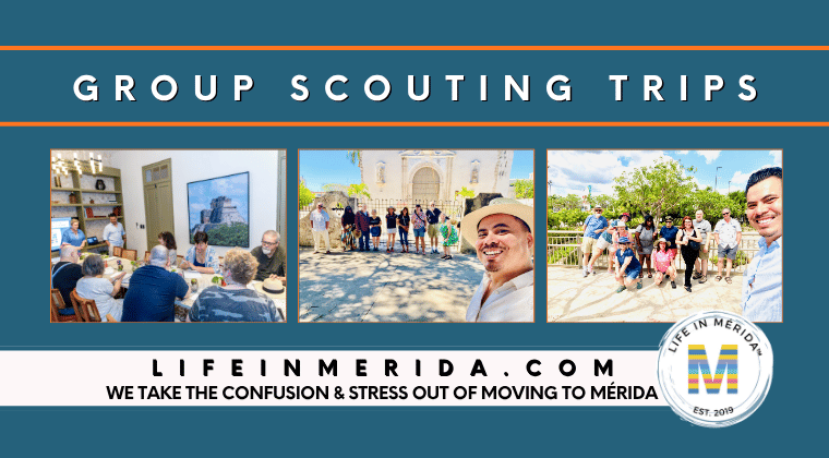 A small, diverse group of people attentively listening to a guide in a beautiful, shaded Merida plaza during a group scouting trip.