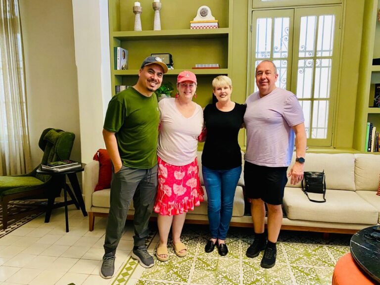 Amy Jones and Angel Rodriguez with guests in a hotel in Centro Merida Mexico