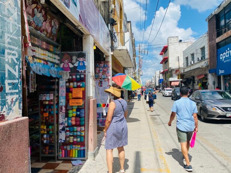 People walking along the street in downtown Merida Mexico